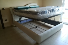 Letto a contenitore di ns produzione con doppia alzata